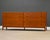 A beautiful modular mid century modern eight drawer dresser sitting on a single base by John Stuart. Professionally...