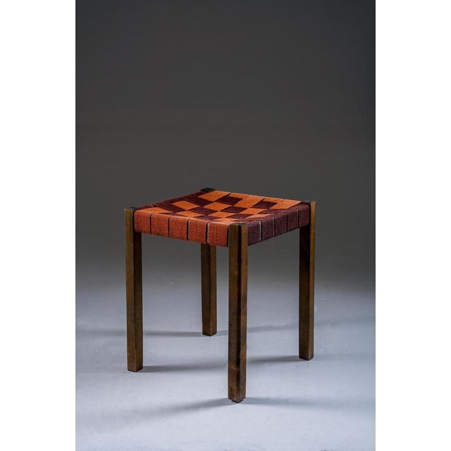 Compact and well-proportioned stool in birch, designed by Axel Larsson for Gemla. The clean, square frame is paired with...