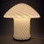 A stunning and iconic mushroom-shaped blown glass table lamp with a swirl motif, an expression of the finest Space Age...