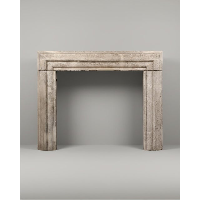 Monumental 17th-century Italian limestone fireplace mantel in Renaissance style, featuring a characteristic and grand...