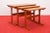 This set of teak nesting tables was designed by Arne Wahl Iversen and produced by Vinde Møbelfabrik in Denmark in the...
