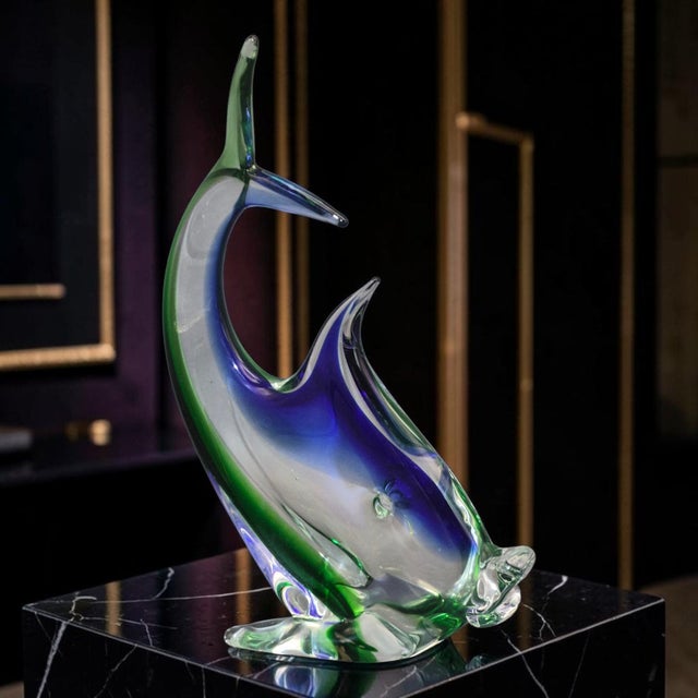 This Vintage Italian Hand-Blown Art Glass Fish Figurine is a unique handmade piece originating from Venice. The multicolor...