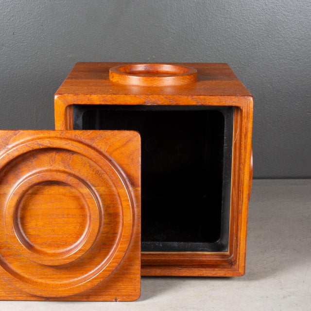 ABOUT An original mid-century Jens Quistgaard Teak cube ice bucket with black, plastic insert. Impressed stamp on the...