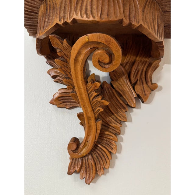 The Italian Rococo revival style of the pair of wall shelves would make an attractive statement in your dwelling. The...