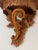 The Italian Rococo revival style of the pair of wall shelves would make an attractive statement in your dwelling. The...