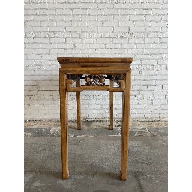 Fantastic Chinese elm altar table from the late Qing dynasty. Rectangular form with carved apron and four square legs...