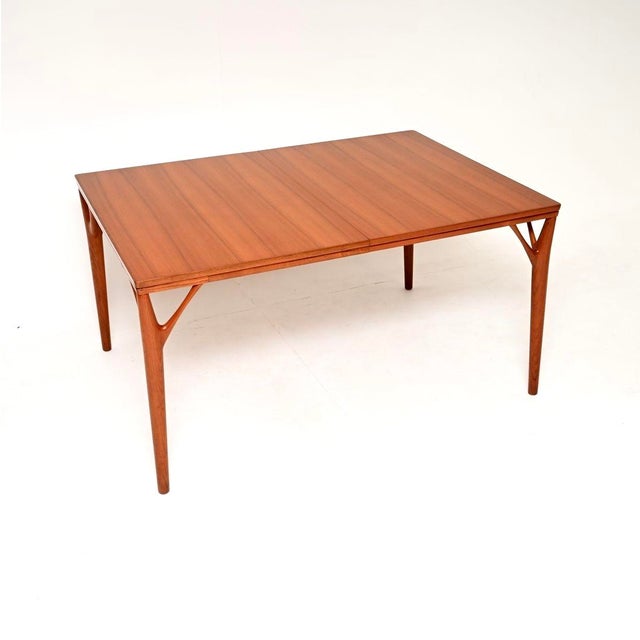 A magnificent Danish vintage teak dining table by Willy Sigh. It dates from the 1960’s, this is the model 180 ‘Tree leg’...