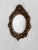 Mirror gilded bronze regency and "rocaille", decorated with scrolls, shells and foliage