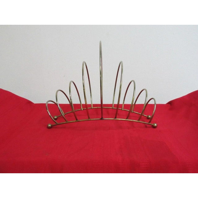 A Mid-Century wire rack. Great shape, tight and sturdy. Shows some pitting and corrosion.