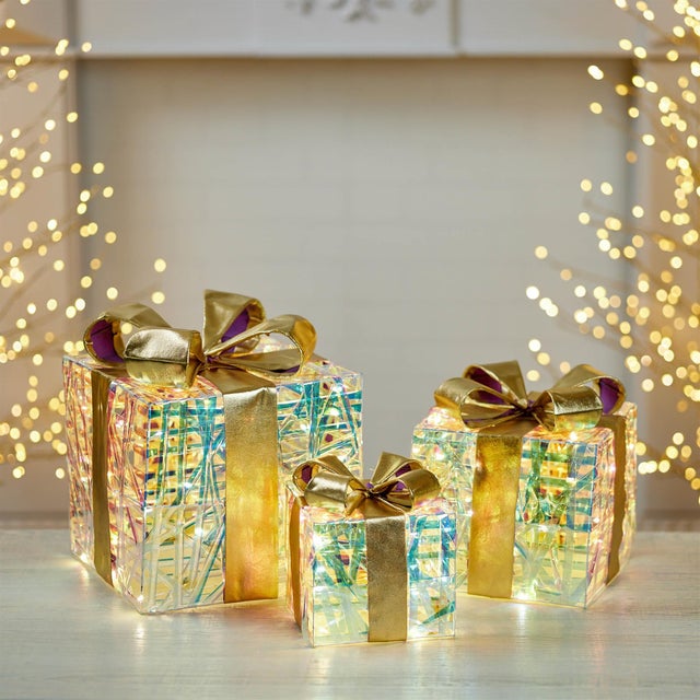 Add a touch of holiday elegance to your seasonal decor with this set of LED Woven Packages with Bows. Featuring a festive...