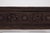 Carved wooden panel originating from Chettinad, Tamil Nadu, decorated with deeply carved motifs combining mythical...