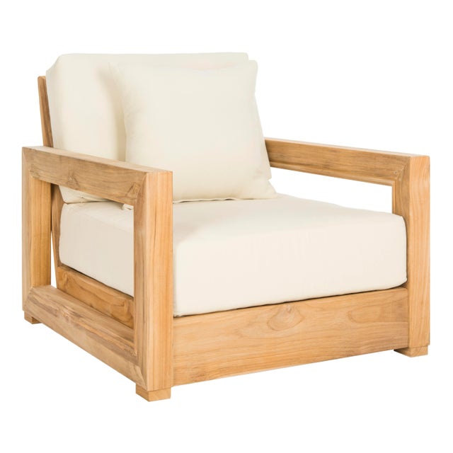 The sleek angels and minimalist style of this contemporary teak armchair transform any outdoor living area into a modern...