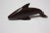 Carved dolphin circa 1970s sculpted from iron wood (an extremely dense wood, resembling rosewood in color and grain,...