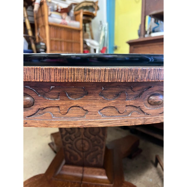 This table has aged beautifully and is the perfect center piece for a room. Beautiful detailed Hand carved Tiger oak table...