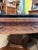 This table has aged beautifully and is the perfect center piece for a room. Beautiful detailed Hand carved Tiger oak table...
