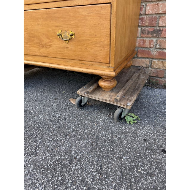 This is a lovely antique pine chest! This piece dates to the 19th century and has lovely patina. The wood has a warm glow,...
