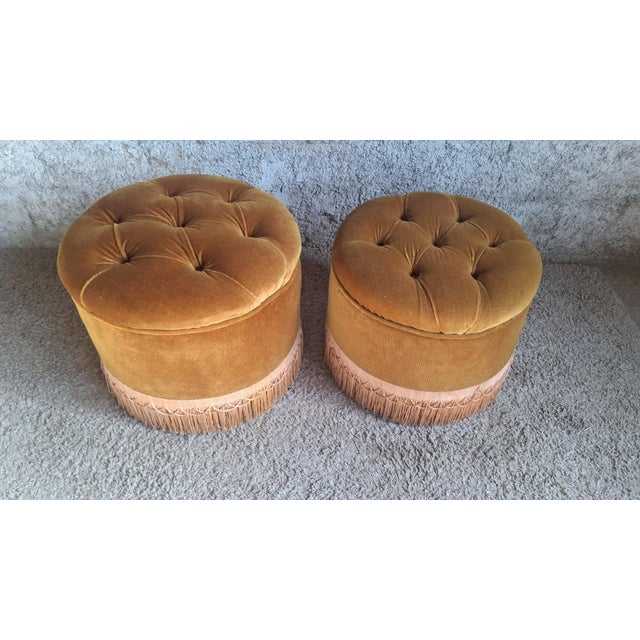 A beautiful, albeit inaccurate, pair of round poufs in the napoleon iii style, dating from the early 20th century....