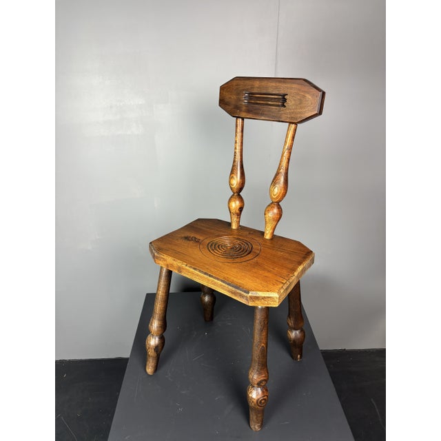 Gorgeous French midcentury small side chair most likely form the Breton region, ca 1950s. This occasional chairs oak wood...