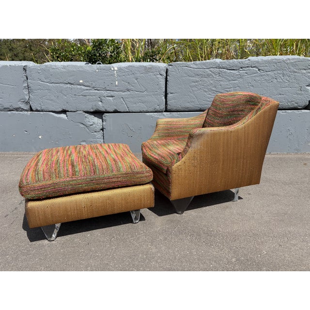 Designer Lounge Chair and Ottoman with Lucite Legs. Set needs to be recovered. Legs are in great condition. The ottoman is...