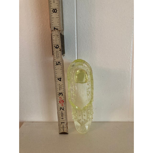 Yellow Vaseline Glass Slippers. Vintage Daisy and Button pattern. Like new. They go as a pair.