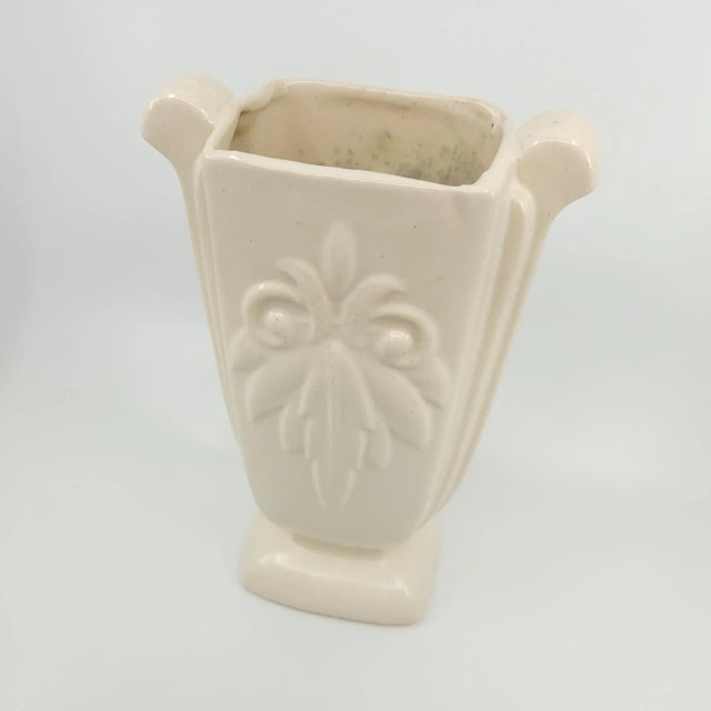 Vintage Greek Deco Ceramic Vase. Stunning cream color with leaf pattern, deco shape. Stamped USA on bottom. Some crazing,...