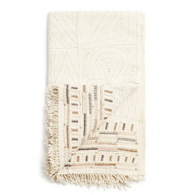 Unah Brown is a fully embroidered throw , with one of a kind beautiful handwork highlighting the borders in colorful...