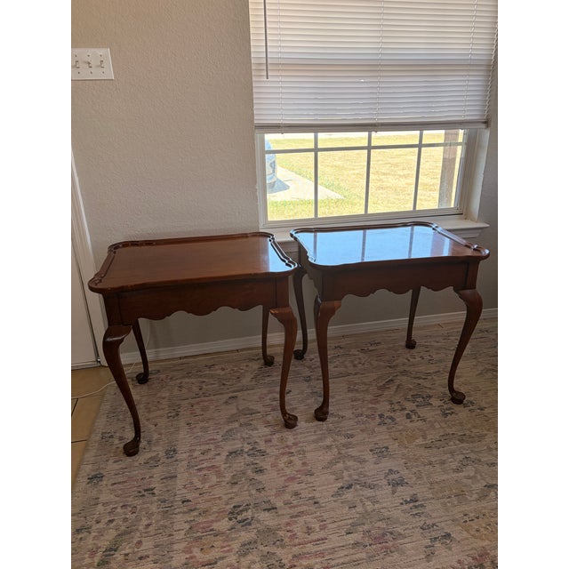 Elegant matching pair of vintage Councill Craftsmen mahogany end tables, showcasing the refined traditional styling and...