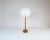 This solid teak table lamp was produced in Sweden during the 1960s and most likely made at Stilarmatur Tranås. A rounded...