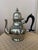 This is a vintage 1980s Kirk Stieff "Old Annapolis" polished pewter teapot featuring an ebonized black handle. I have...