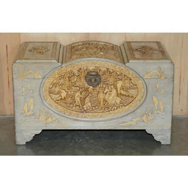 Highly decorative, Antique Chinese Export hand carved linen or toy chest circa 1920's with the original painted and...