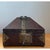 Crafted from rich wood and brass-toned metal hardware, this vintage decorative box showcases a distinctive pyramid-shaped...
