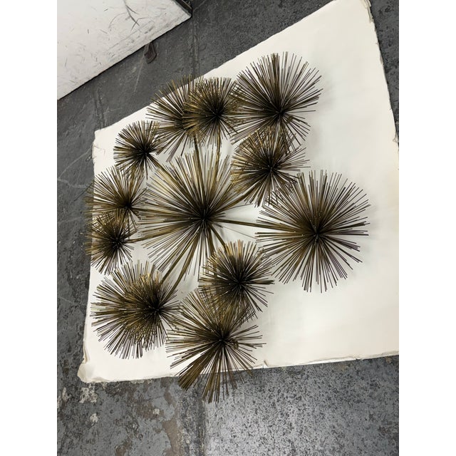 Design Plus Gallery presents a Vintage Curtis Jere Brass Sea Urchin/Dandelion Wall Sculpture. Composed of thirteen...
