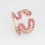 Stylish Sabine Getty pink topaz ''wiggly'' ring crafted in 18 karat yellow gold. Pink topaz totals an estimated 2.88...
