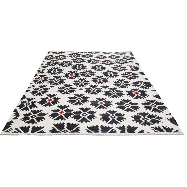 Afghan Modern Kilim Flatweave with care using traditional rug-making techniques, this wool rug blends timeless...