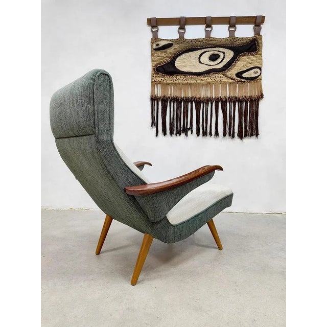 Beautiful Elegant Scandinavian Design. This rare beautiful armchair from the 60s is a feast for the eyes. The organic...