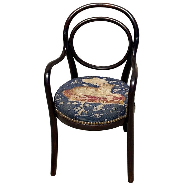 Victorian style child size Thonet number 10 oak side chair features an elegant, sculptural frame crafted from warm-toned...