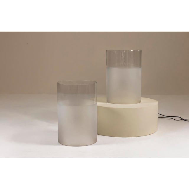 A subtle glow and refined geometry come together in this set of two “Fatua” table lamps by Guido Rosati for Fontana Arte....