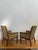 Make a sophisticated architectural statement with this rare pair of high-back lounge chairs, likely manufactured by the...