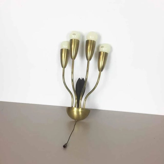 Article: Brass wall sconces Producer: Origin Italy Age: 1960s. Description: This modernist wall light was produced in...