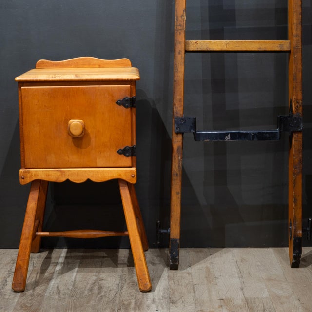 ABOUT A Virginia House solid maple nightstand featuring a distinctive dough box design and dark metal hinges Very solid....