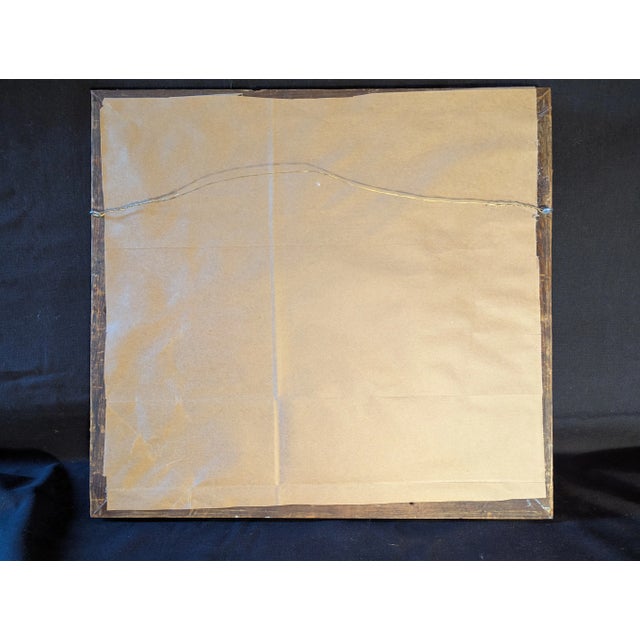 Brass repousee plate depicting a courting scene surrounded by birds and foliage. Framed with a velvet liner and late 19th-...