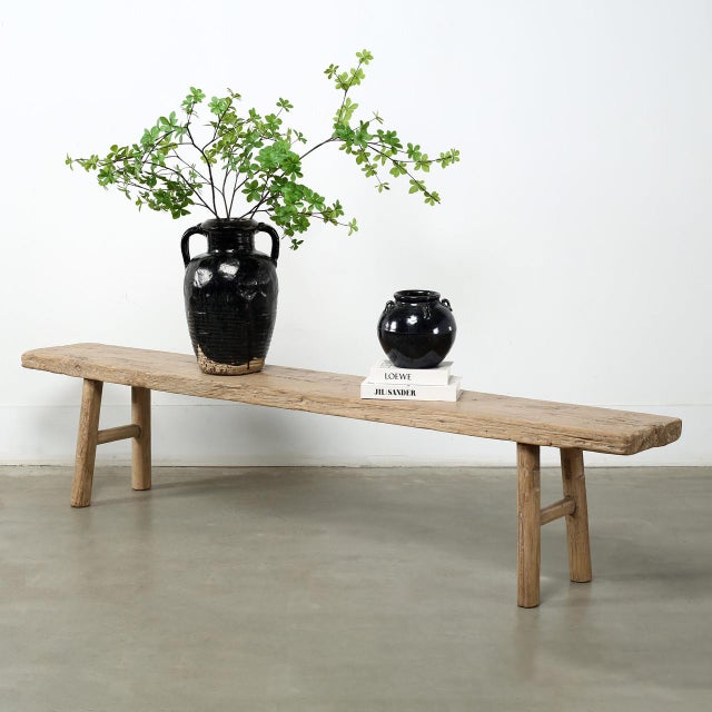 This large vintage bench was handcrafted decades ago and used in farmhouse settings for everyday seating. Made from solid...