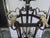 An extra large 12 light wrought iron lantern with both silver and gold gilt highlights. It could have glass panels if...