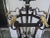 An extra large 12 light wrought iron lantern with both silver and gold gilt highlights. It could have glass panels if...