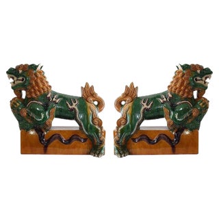 20th Century Asian Sancai Glazed Foo Dogs on Pedestals - a Pair For Sale