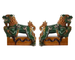 20th Century Asian Sancai Glazed Foo Dogs on Pedestals - a Pair