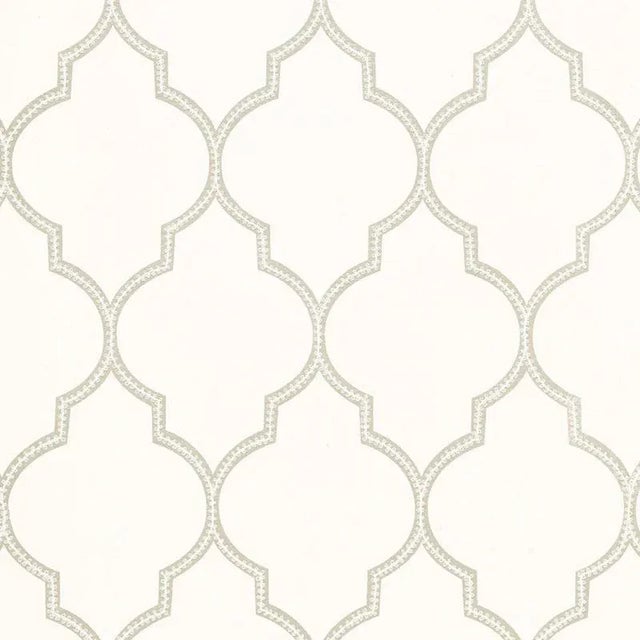 This large-scale pattern has a depth and complexity created through the layering of print and embroidery. Subtle...