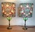 Beautiful pair of vintage lamps featuring green glass globes with brass base. These lamps have been paired with lampshades...