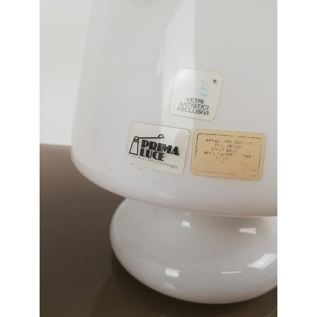 A splendid pair of vintage table lamps, perfect for use as bedside lamps. They were made in Italy by "Prima Luce " with...