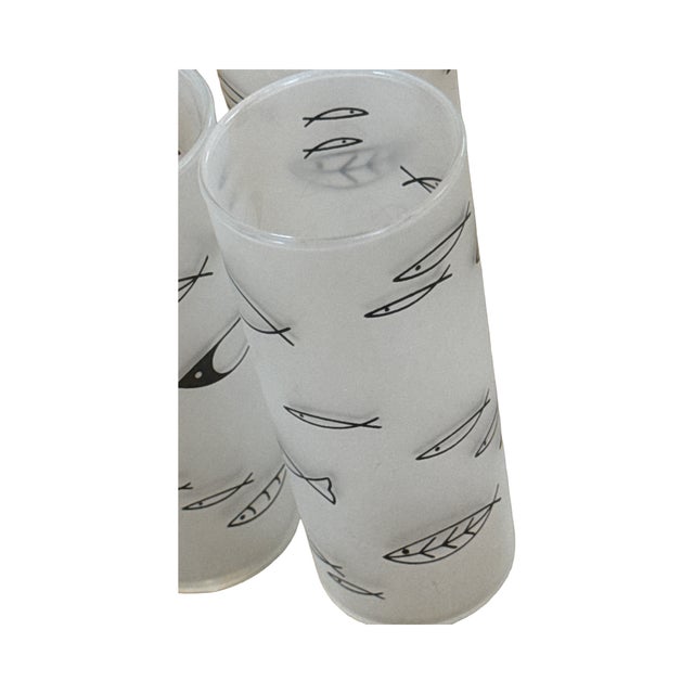 This striking set of three 6-inch Collins glasses represents the playful sophistication of mid-century "Atomic" barware....